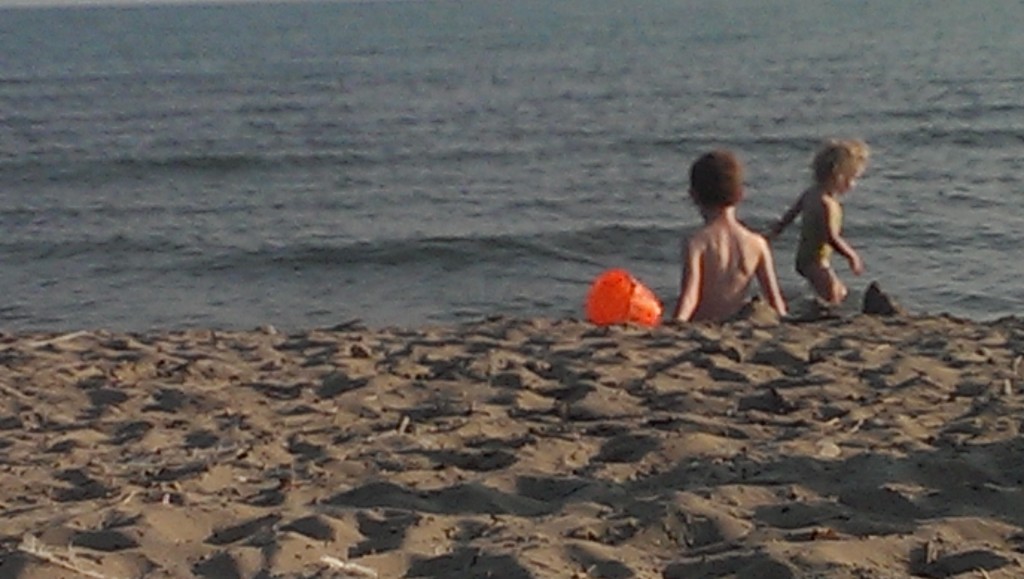 Kids on beach in Port Stanley, Ontario